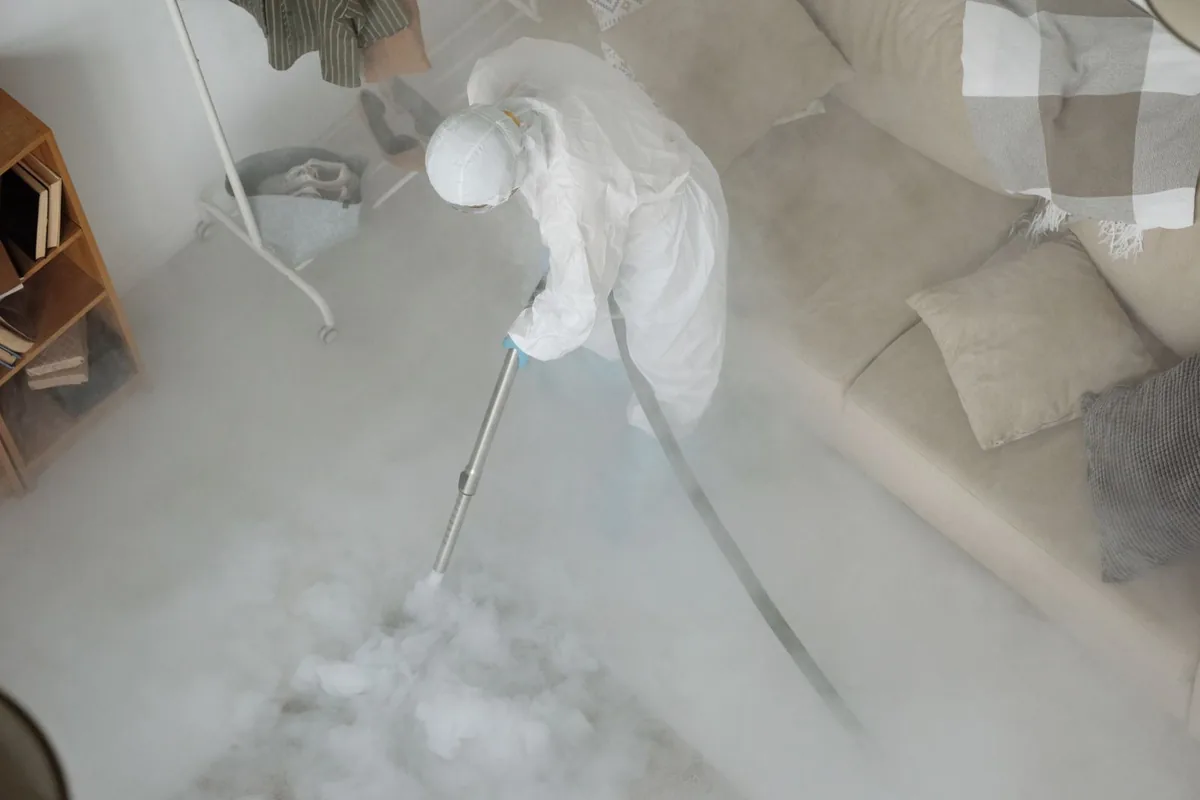 Biohazard cleanup technician in protective equipment, Richfield, MN